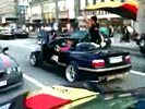German soccer fan falls from convertible during celebration.